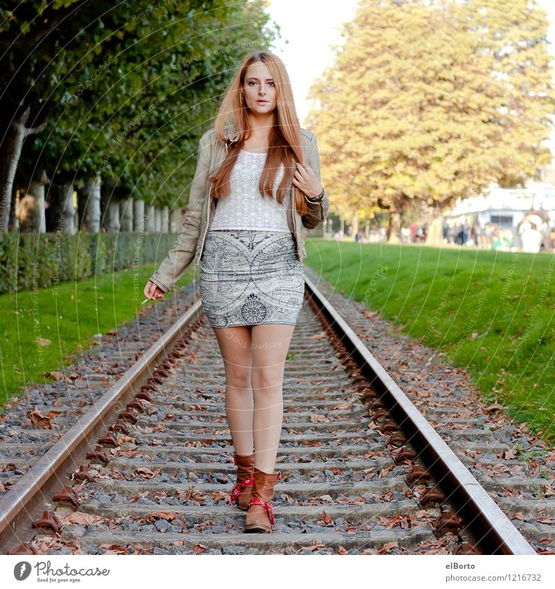 rail Human being Feminine Young woman Youth (Young adults) Woman Adults 1 18 - 30 years Tree Traffic infrastructure Rail transport Railroad tracks Fashion Dress