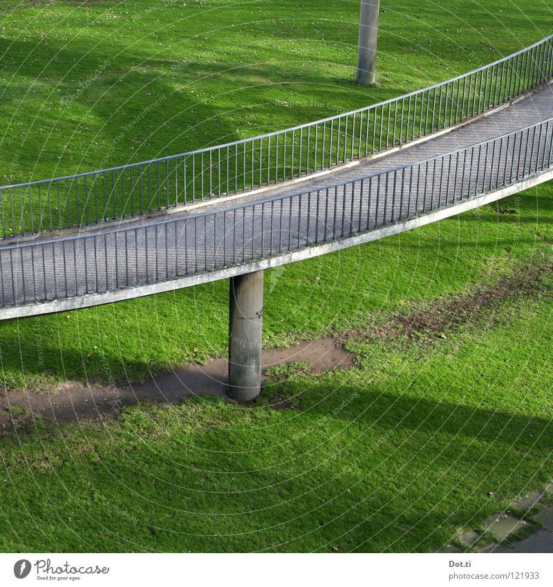 dash off into the open Racecourse Grass Park Meadow Bridge Manmade structures Concrete Above Gray Green Ramp Expressway exit Gyroscope Spiral Winding staircase