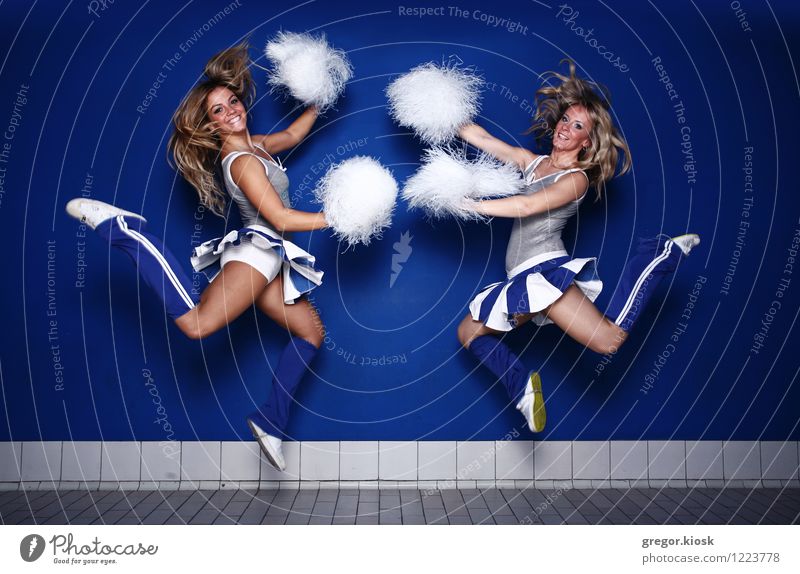 Jump Around Cheerleaders Joy Hair and hairstyles Athletic Feasts & Celebrations Sports Ball sports Sports team Sporting event Stadium Professional training