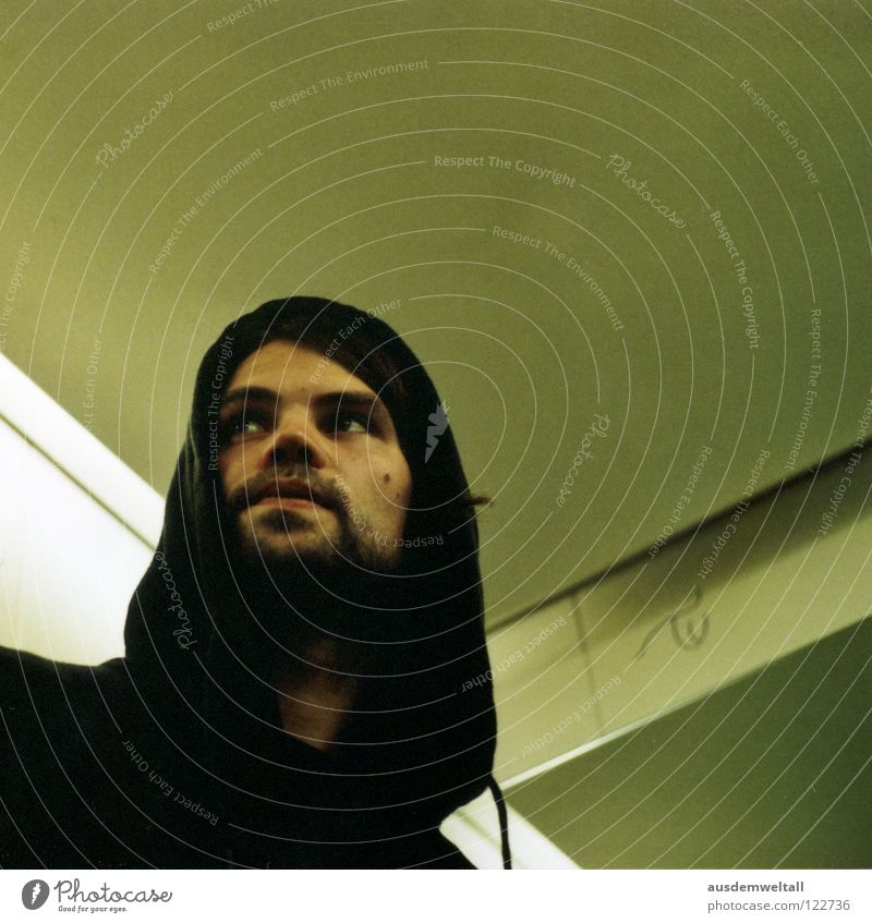 rope Masculine Man Portrait photograph Hooded (clothing) Black Facial hair Elevator Green Beige Analog Human being Emotions Looking Calm 50mm Scan Interior shot