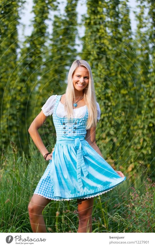 Dirndldeandl Beautiful Hair and hairstyles Summer Oktoberfest Girl Woman Adults Plant Grass Field Dress Blonde Eroticism Happiness Fresh Blue Green Bavarian