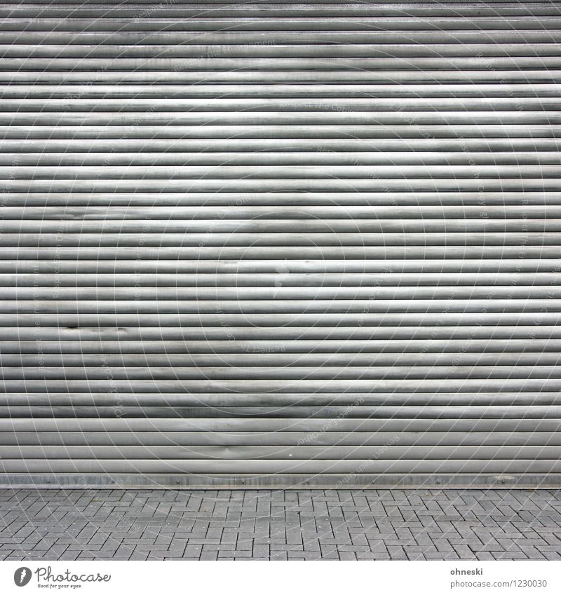 Fifty Shades of Grey Factory Manmade structures Facade Roller shutter Roller blind Courtyard Stone Metal Line Gray Crisis Closed Dirty Colour photo