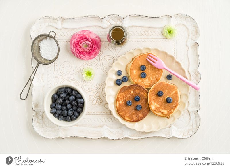 Blueberry Pancakes Dessert pancake Confectioner`s sugar Fork Sieve Tray maple syrup Flower Nutrition To have a coffee Plate Jump Pink Colour photo Studio shot