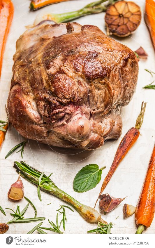 Leg of lamb roast and roasted seasonal vegetables Food Meat Vegetable Herbs and spices Nutrition Dinner Banquet Organic produce Style Design Table Kitchen