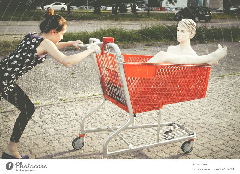 go shopping ... Child Girl Young lady Youth (Young adults) Young woman Shopping Push Running Shopping Trolley Mannequin High heels Freedom Infancy Whimsical