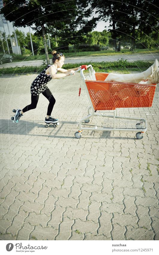 go shopping . Child Girl Young lady Youth (Young adults) Young woman Shopping Push Running Running sports Shopping Trolley Mannequin High heels Infancy