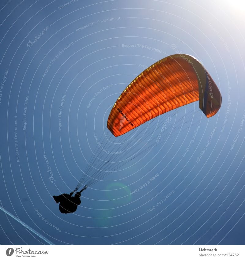 just a whistle Paraglider Air Leisure and hobbies Red Warmth Paragliding Beginning Funsport Aviation Sports Playing Sun Freedom Colour Blue Wind Sky