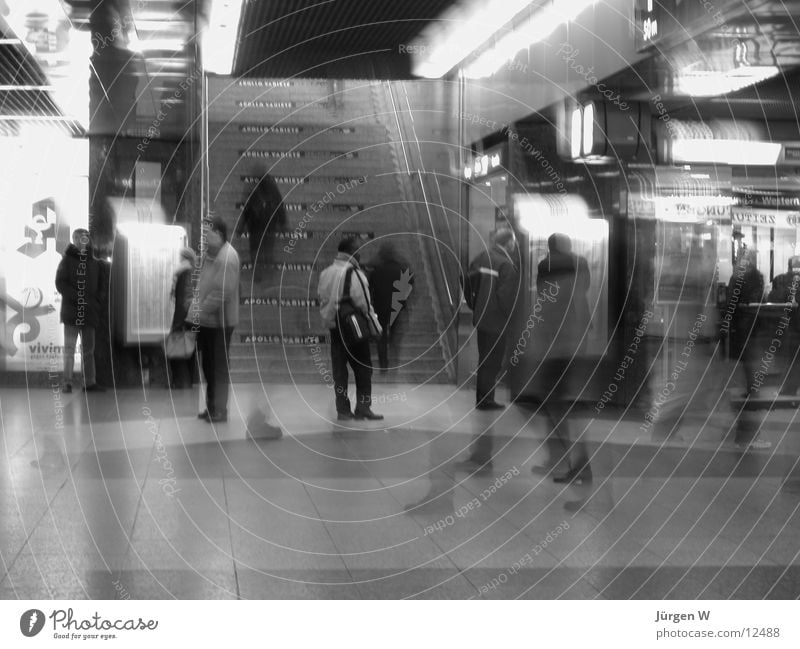 at station 2 Blur Diffuse Long exposure Train station Human being Black & white photo Stairs Haste human railway station hurries