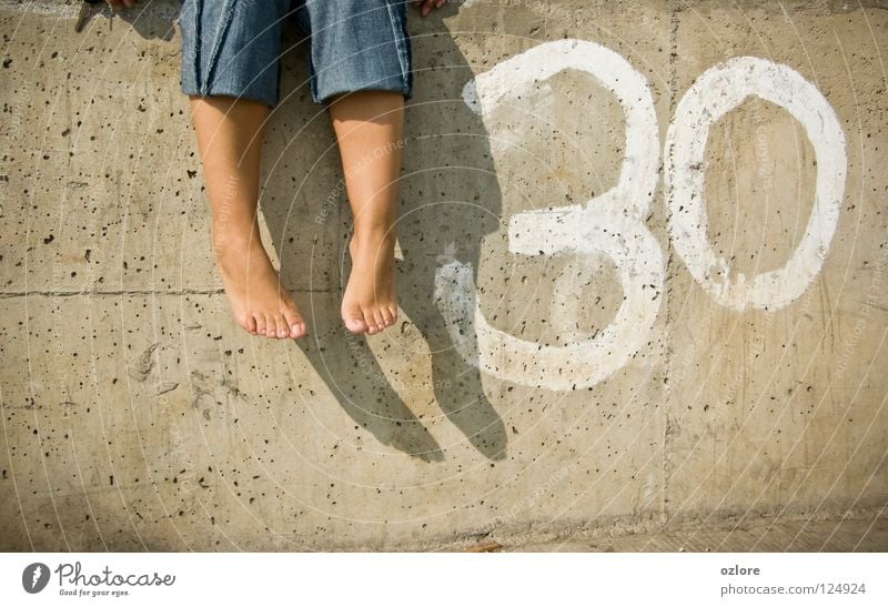 Thirty Feet 30 2 feet fisherman pants grey shadow sit day Wall (barrier)