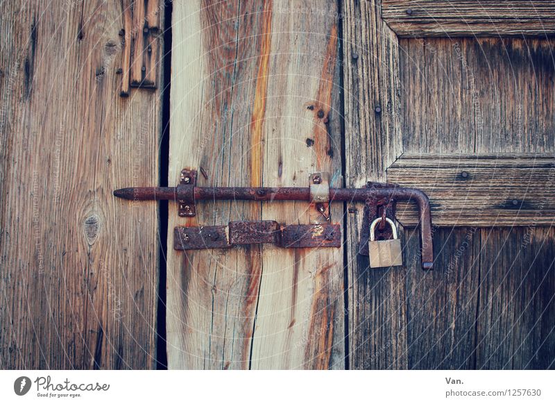 behind lock and bolt Gate Door Lock Locking bar Wood Old Brown Rust Colour photo Subdued colour Exterior shot Detail Deserted Day Contrast