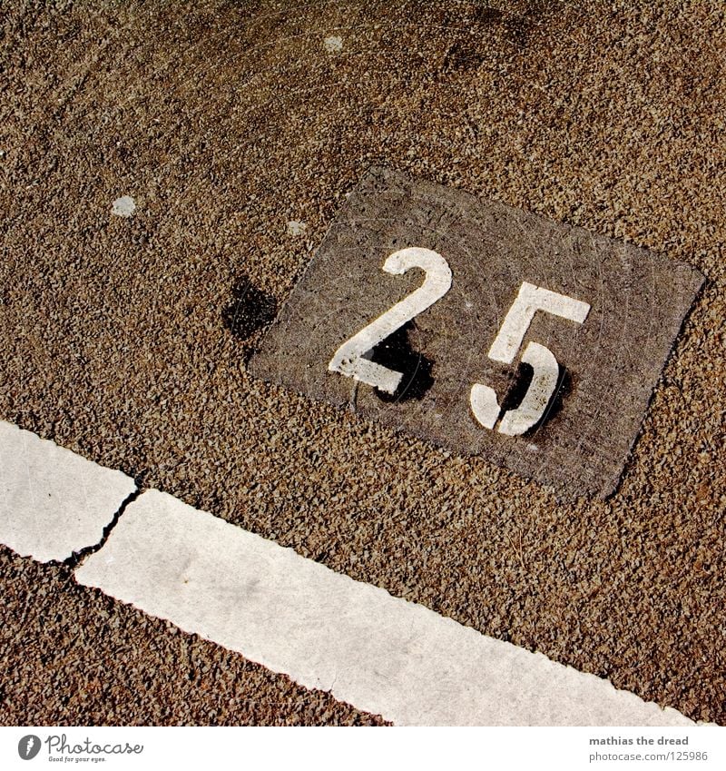 25 Parking lot Digits and numbers Tar White Minimal Transport Twenties Places Hard Cold Physics Traffic infrastructure Street sign Line Contrast Crazy