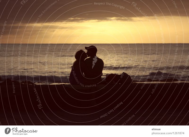 The goodnight kiss. Young woman Youth (Young adults) Young man Couple 2 Human being Water Sunrise Sunset Beach Kissing Romance Silhouette Lovers Dream Embrace