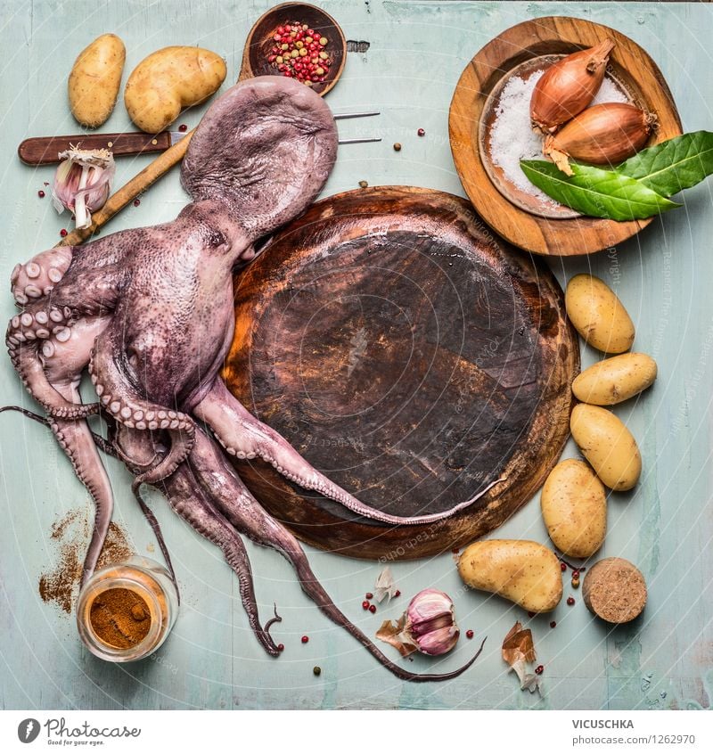 Whole Octopus with ingredients Seafood Vegetable Herbs and spices Nutrition Lunch Dinner Plate Bowl Fork Style Healthy Eating Table Kitchen Restaurant Design