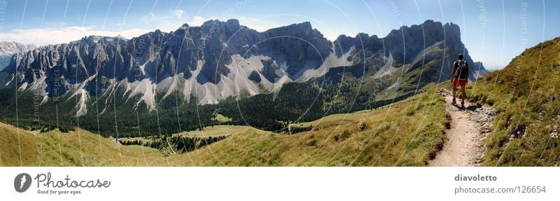 The mountain calls South Tyrol Mountain range Hiking Dolomites Backpack Panorama (View) Summer Hiking boots Federal State of Tyrol Footpath Meadow Grass Italy