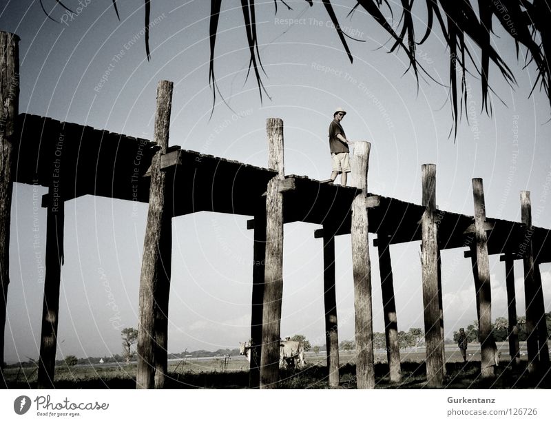 In retrospect Myanmar Mandalay Teak Wood Wooden bridge Asia Plank Tourist Cap Bermuda Sunglasses Bridge u-leg taunghtaman Pole Sky