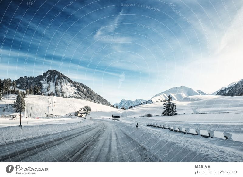 Winter landscape in the Alps Mountain Nature Landscape Transport Means of transport Traffic infrastructure Motoring Street Cold Blue White mountains hill