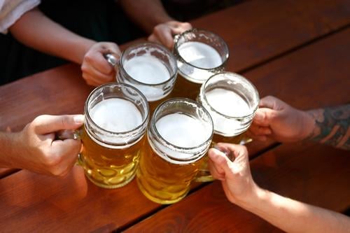 People drinking beer in a Bavarian beer garden Beverage Beautiful Party Oktoberfest Closing time Family & Relations Hand Feasts & Celebrations Drinking