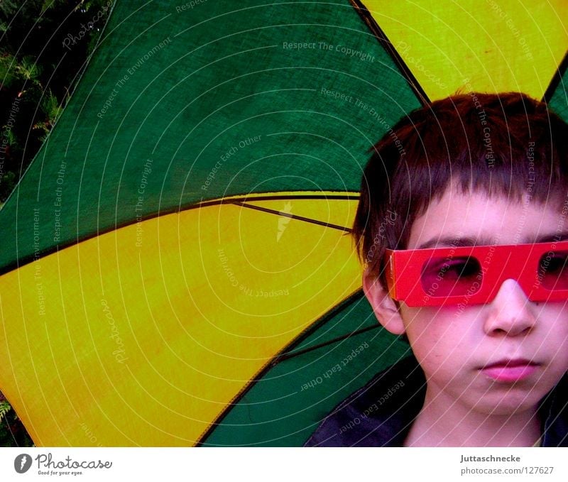 When the Rain begins to fall.... Umbrella Yellow Red Eyeglasses Sunglasses Portrait photograph April Whim Child Boy (child) Earnest Grief Safety Screen. green
