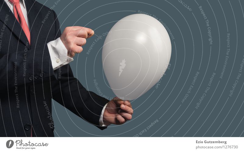 A businessman pricks a balloon with a needle Office Economy Business SME Career Success Meeting Masculine Hand 1 Human being 30 - 45 years Adults Suit Tie Toys