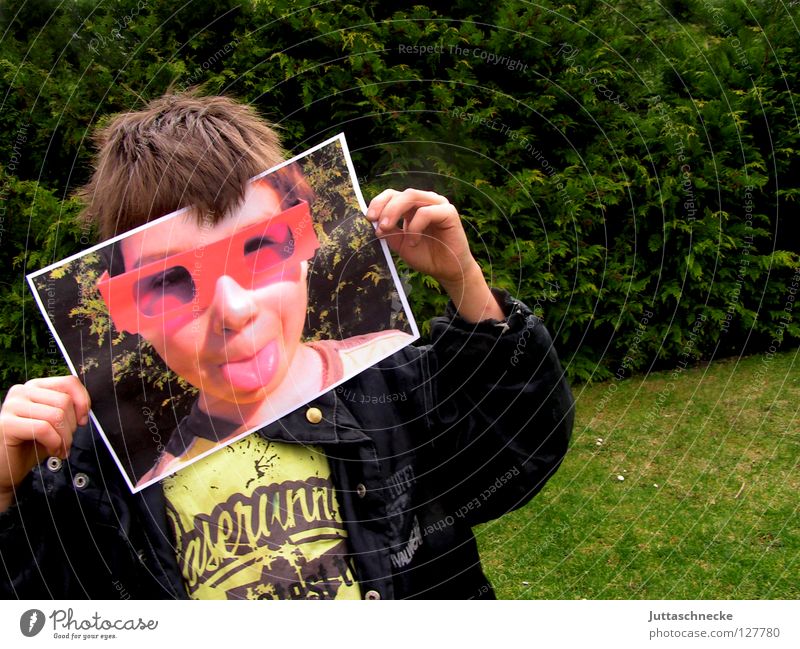 The second face Boy (child) Child Portrait photograph Eyeglasses Sunglasses Pink Red Happiness Joy Cool (slang) Brash Poster Photography Grimace Identity Moral