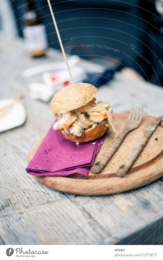 Surf 'n' Turf Burger Food Meat Fish Seafood Dough Baked goods Roll Hamburger Nutrition Lunch Dinner Fast food Cutlery Knives Fork To enjoy street food speared