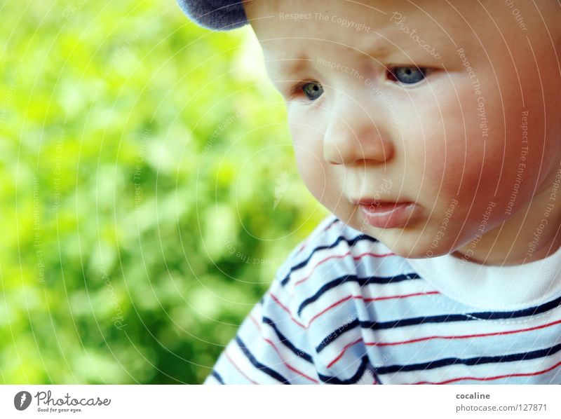 mini thinker Baby Child Skeptical Toddler Cap Striped Eyebrow Challenging Gnome Sweet Portrait photograph Facial expression Grief Looking Boy (child) Eyes Face