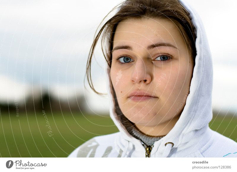 blue eyes Woman Portrait photograph Lips Strand of hair Cold Grass Beautiful Face Eyes Nose Mouth Hair and hairstyles look view. hood outside Nature