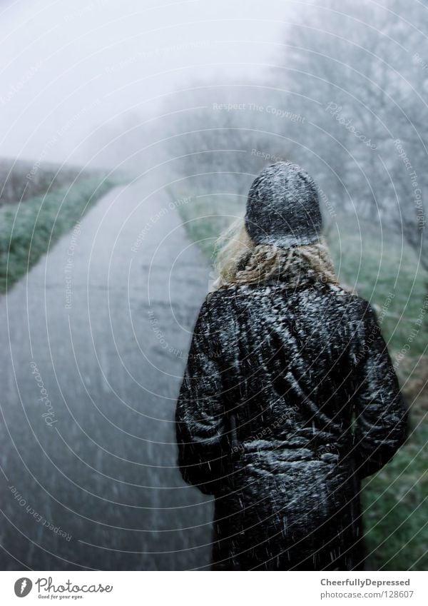 Girl walks alone Woman Storm Fog Cold Woolen hat Winter Future Loneliness Exterior shot Life Snow Lanes & trails Street Americas coldness way landslide