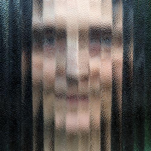 Woman behind glass Feminine 1 Human being Brunette Long-haired Glass Line Stripe Discover Mysterious Contentment Idea Inspiration Art Perspective Puzzle
