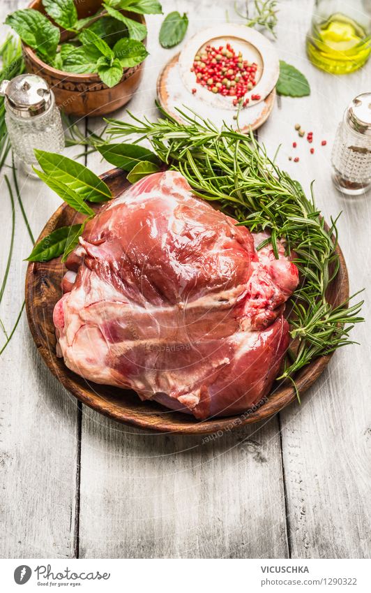 Prepare leg of lamb for roasting Food Meat Herbs and spices Cooking oil Nutrition Lunch Dinner Banquet Organic produce Diet Plate Bowl Mug Bottle Glass Style