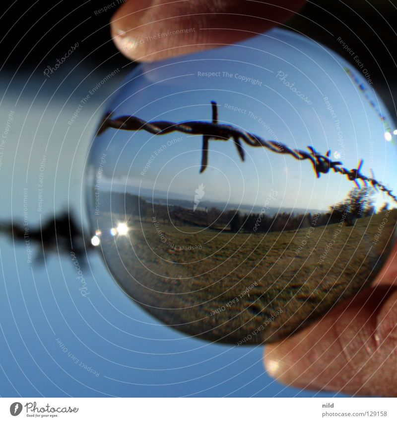 Lens in front of the lens 2 Reflection Rotated Foreground Background picture Point of light Round Blur Vaulting Beautiful Convex Focal point Barbed wire Meadow