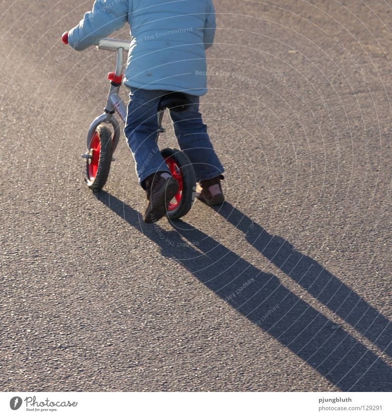 Run, rad! Child Light Asphalt February Back-light Contentment Practice Playing To go for a walk Shadow Street Study Kiddy bike