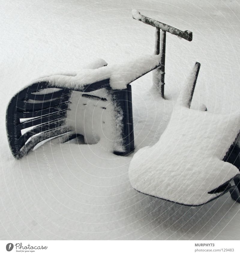 Snowstorm in your own garden Gale Air Gust of wind Chaos Garden chair Garden table Table Chair Snowflake Muddled Untidy Winter Topple over Furniture Wind squall