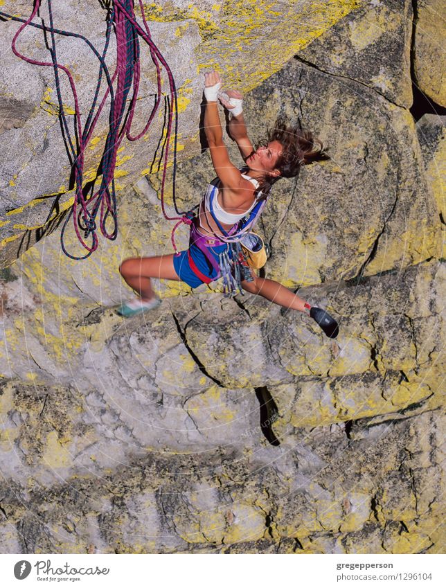 Female climber gripping the edge. Adventure Climbing Mountaineering Success Rope Young woman Youth (Young adults) 1 Human being 18 - 30 years Adults Peak