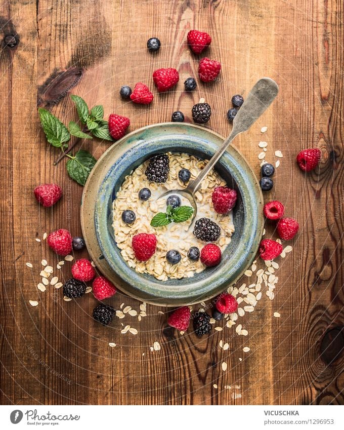 Oat flakes with milk and berries for breakfast Food Dairy Products Fruit Grain Nutrition Breakfast Organic produce Diet Milk Plate Bowl Spoon Style Design