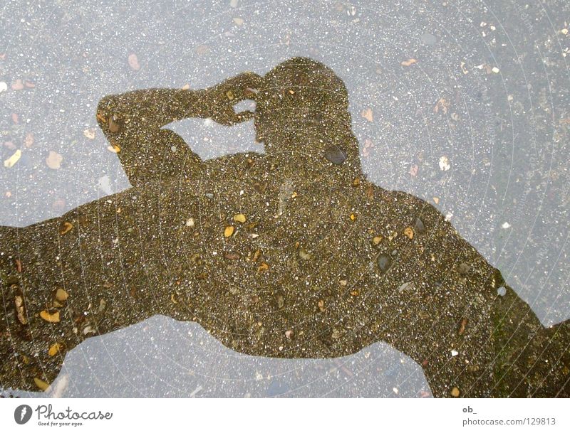 groundheads Puddle Reflection Man Silhouette Floor covering Stone slab Subsoil Under Water Shadow Human being Above