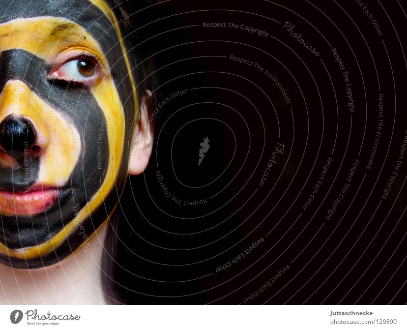 Mixed feelings Black Yellow Make-up Wearing makeup Spiral Sideways glance Portrait photograph Face Striped Apply make-up Youth (Young adults) Colour Mask Head