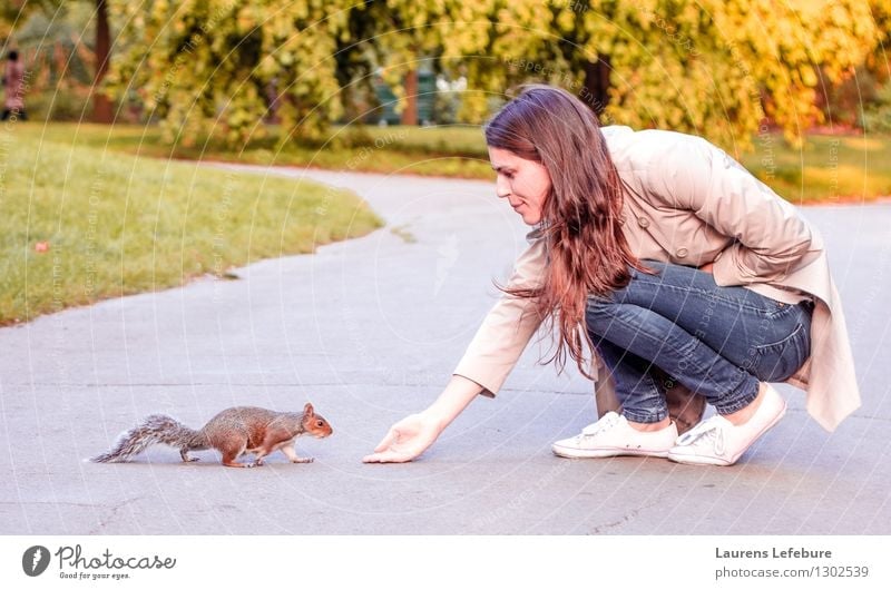 Girl and squirrel Feminine - a Royalty Free Stock Photo from Photocase