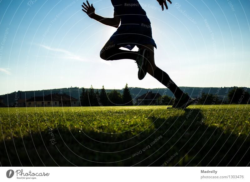 Runner training on a stadium Lifestyle Wellness Sun Sports Human being Man Adults Feet Sky Build Running Movement Speed Loneliness Energy Action athlete