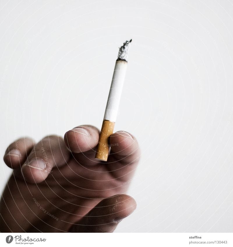Roll that shit Unhealthy Harmful Smoking Cigarette Hand Fingers Odor Malodorous Filter-tipped cigarette To hold on Retentive Bright background Isolated Image