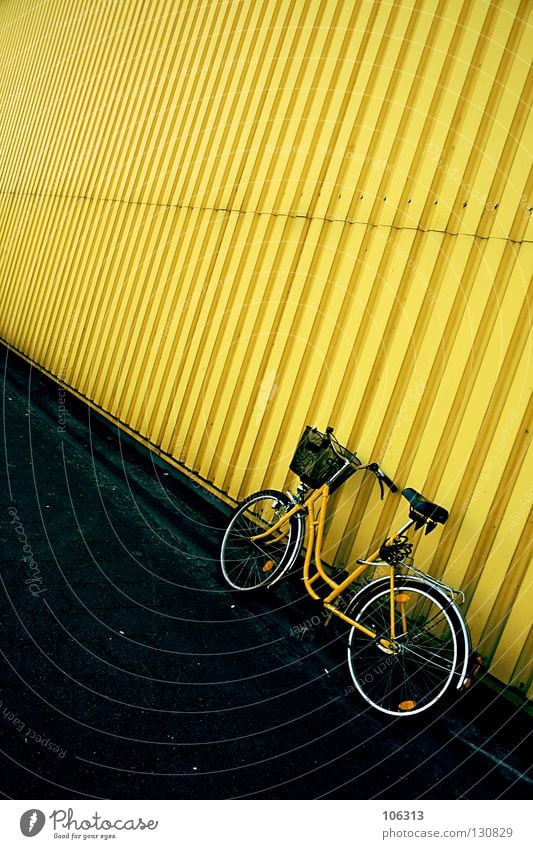 jaundice Yellow Stand Wall (building) Wall (barrier) Tin Corrugated sheet iron House (Residential Structure) Still Life Postman Bicycle Courier Ladies' bicycle