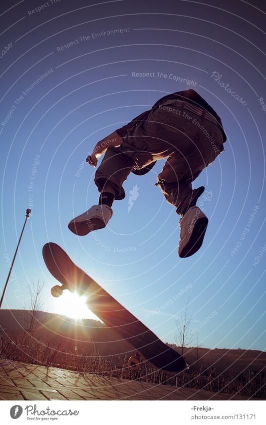 Above the sun Jump Back-light Funsport Skateboarding Sun silhoutte Wheel Shadow