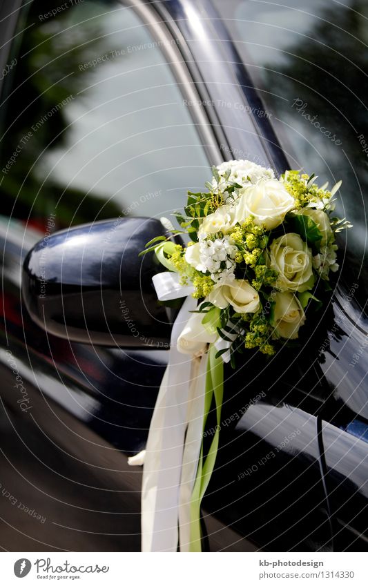 Flower decoration on a wedding car Wedding Motoring Driving Multicoloured bride celebrate celebration Chauffeur flowers rose looking marriage married mirror