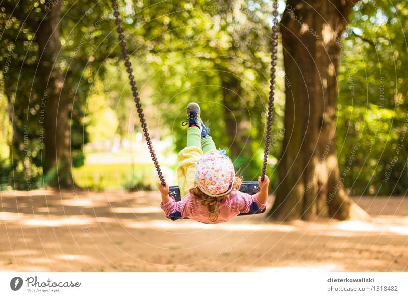 Small child swings Playing To swing Child Girl Infancy 1 Human being 1 - 3 years Toddler Flying Happy Joy Contentment Swing Playground Colour photo