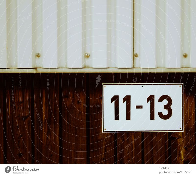 ELEVEN TO THREE TEN 3 10 13 11 Digits and numbers Wall (building) Corrugated sheet iron Dock House number by the time bonded screed typographical label
