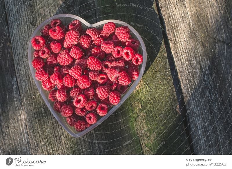 Raspberries in a bowl on wood Fruit Dessert Diet Bowl Beautiful Summer Feasts & Celebrations Valentine's Day Nature Paper Heart Love Fresh Natural Juicy Green
