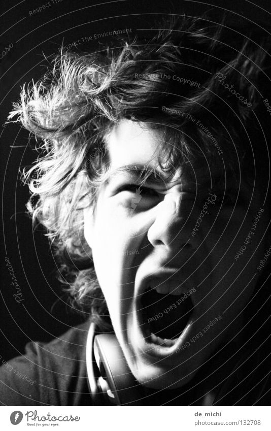 sound Loud Headphones Hair and hairstyles Aggression Anger Scream Facial expression Protest Interior shot Self portrait Monochrome Music Ear uncombed Distorted