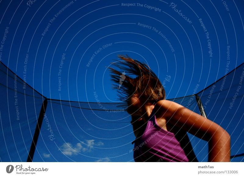 Rocking the Tramp Portrait photograph Jump Brown Woman Brunette Violet Trampoline Funsport Hair and hairstyles Wind Sky Blue Flying hitchhike little bird Hanna