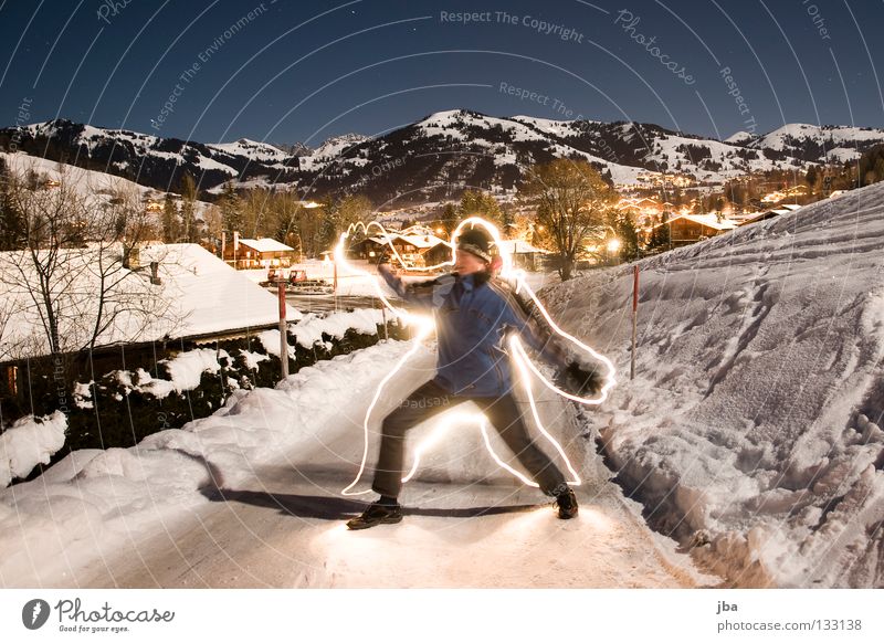 yet again... Long exposure Light Lamp Man Virgin snow Stand Gstaad Mountain Snow Street Joy Shadow Draw Painting (action, work) Blue