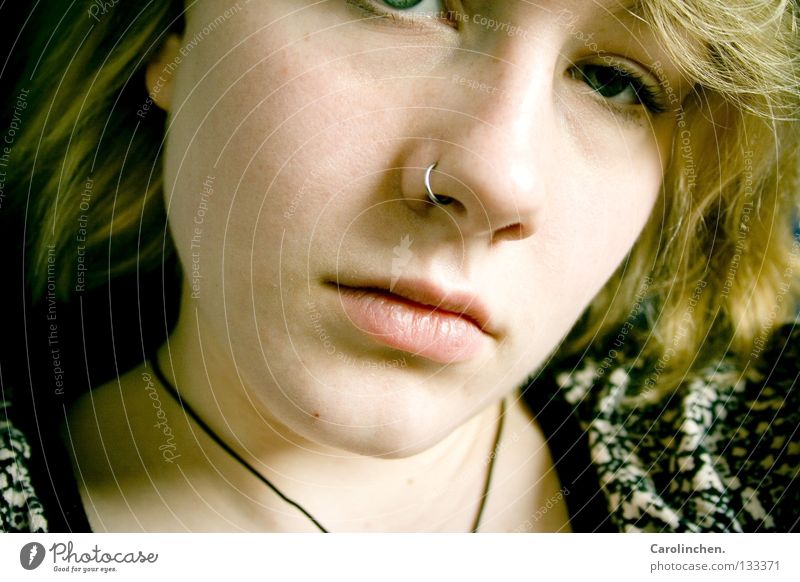 Girls. Face Human being Woman Adults Mouth Lips Piercing Blonde Sadness Yellow Grief Colour Chain Interior shot
